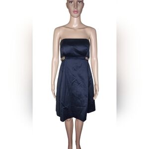 Vintage Chloe women's cotton black little dress with metal accents on the side 2